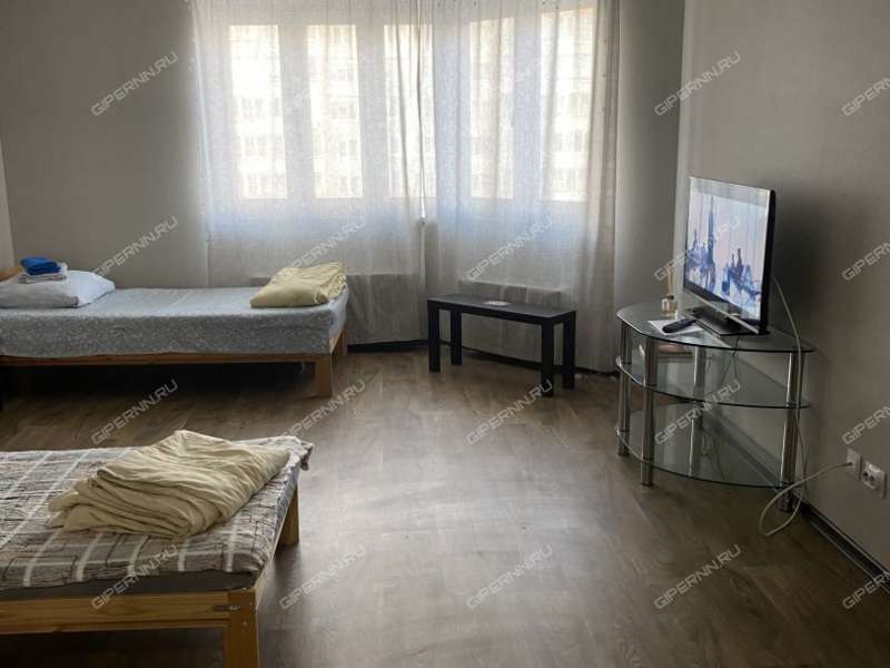 двухкомнатная квартира на сутки в переулке Первостроителей дом 1 к2 город Кстово